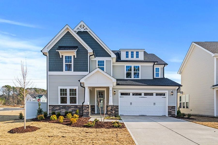 Front exterior of a home in the WyndWater community, located in Hampstead, NC (Image 15).