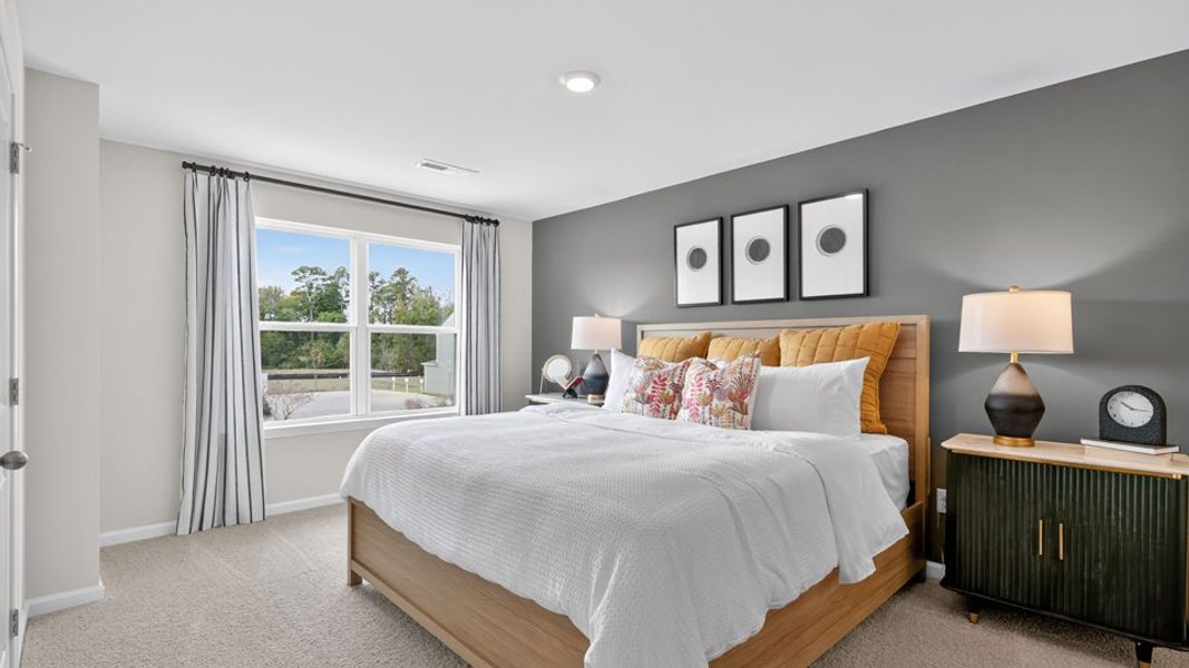 Furnished interior in a model home at The Townes at Belle Grove in Wendell (Image 28).