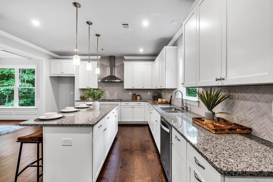 Furnished interior in a model home at The Estates at Hurricane Pointe in Douglasville (Image 28).