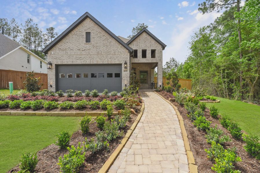 Front exterior of a home in the Evergreen 40s community, located in Conroe, TX (Image 4).