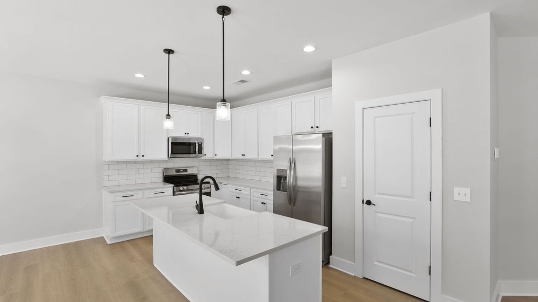 Furnished interior in a model home at Bentley Manor in Greer (Image 6).