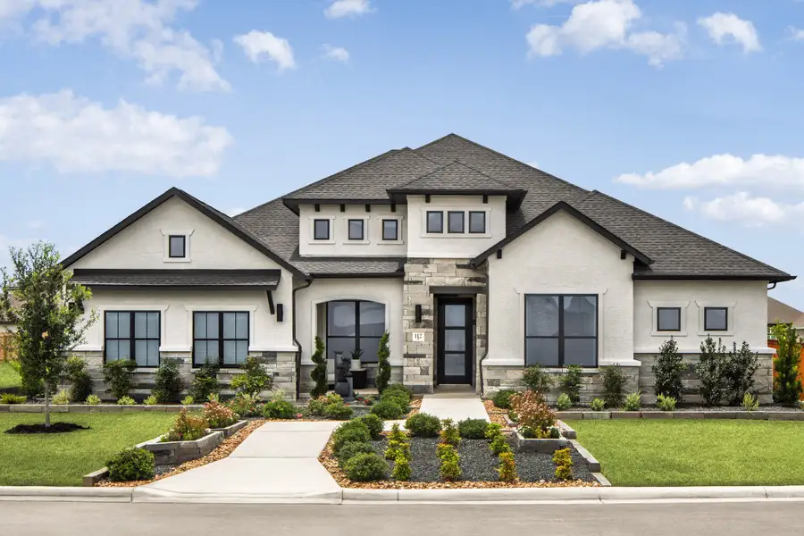 Front exterior of a home in the Megan's Landing community, located in Castroville, TX (Image 1). Front exterior of a home in the Megan's Landing community, located in Castroville, TX (Image 1).