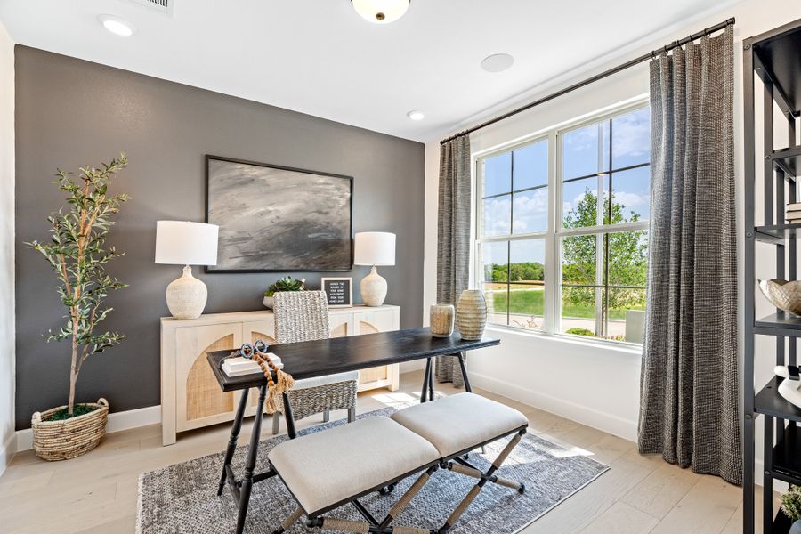 Furnished interior in a model home at Woodcreek in Fate (Image 14).