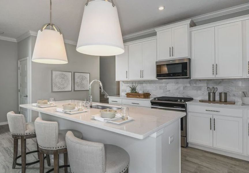 Furnished interior in a model home at Coasterra in Palmetto (Image 8).