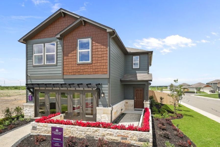 A house with a flower bed.