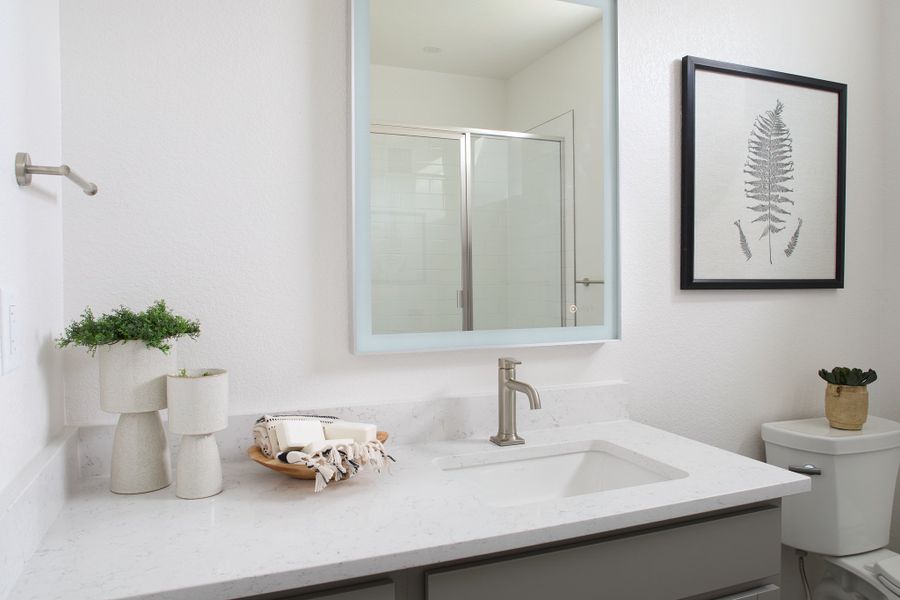 Furnished interior in a model home at Lyric at RidgeGate Condos in Lone Tree (Image 19).