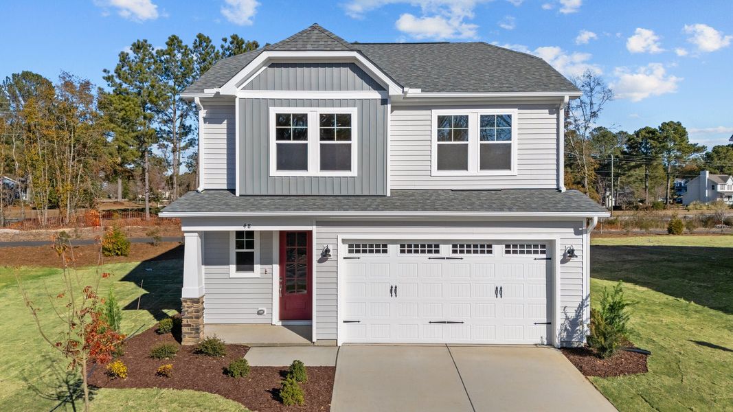 Front exterior of a home in the Highgate community, located in Clayton, NC (Image 15). Front exterior of a home in the Highgate community, located in Clayton, NC (Image 15).