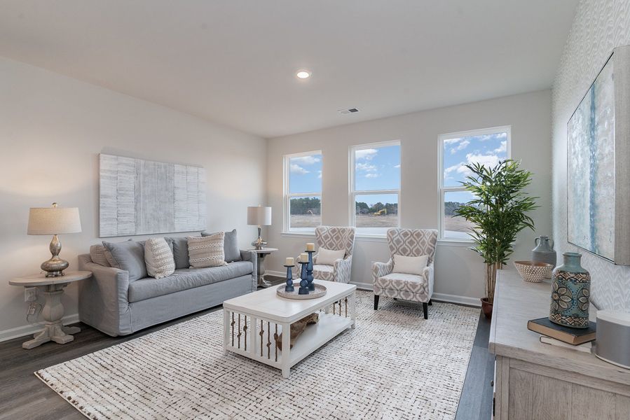Furnished interior in a model home at Kingston Bay in Conway (Image 7).