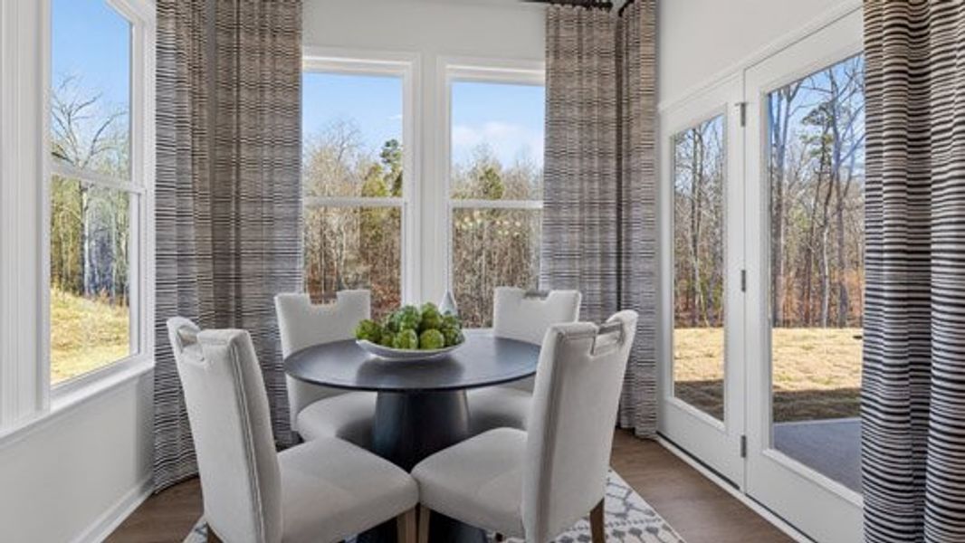 Furnished interior in a model home at The Villas at Galvins Ridge in Sanford (Image 25).