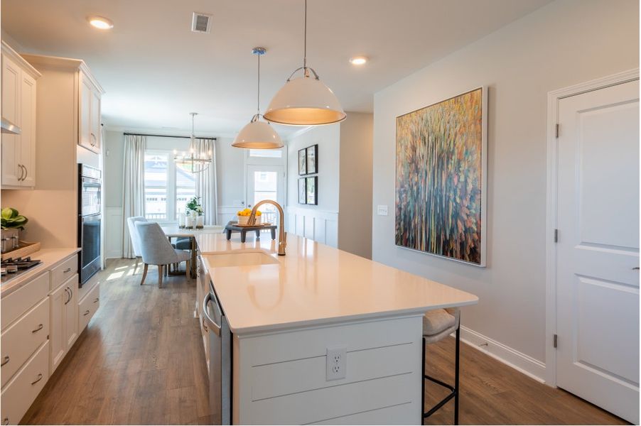 Furnished interior in a model home at The Walk at East Village in Clayton (Image 40). Furnished interior in a model home at The Walk at East Village in Clayton (Image 40).