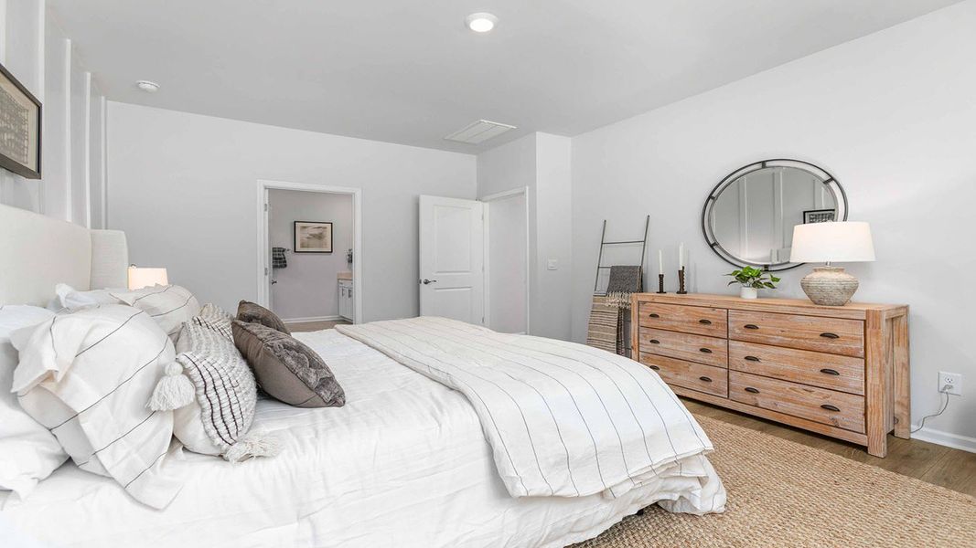 Furnished interior in a model home at The Villas at Kinsley in Jamestown (Image 26).