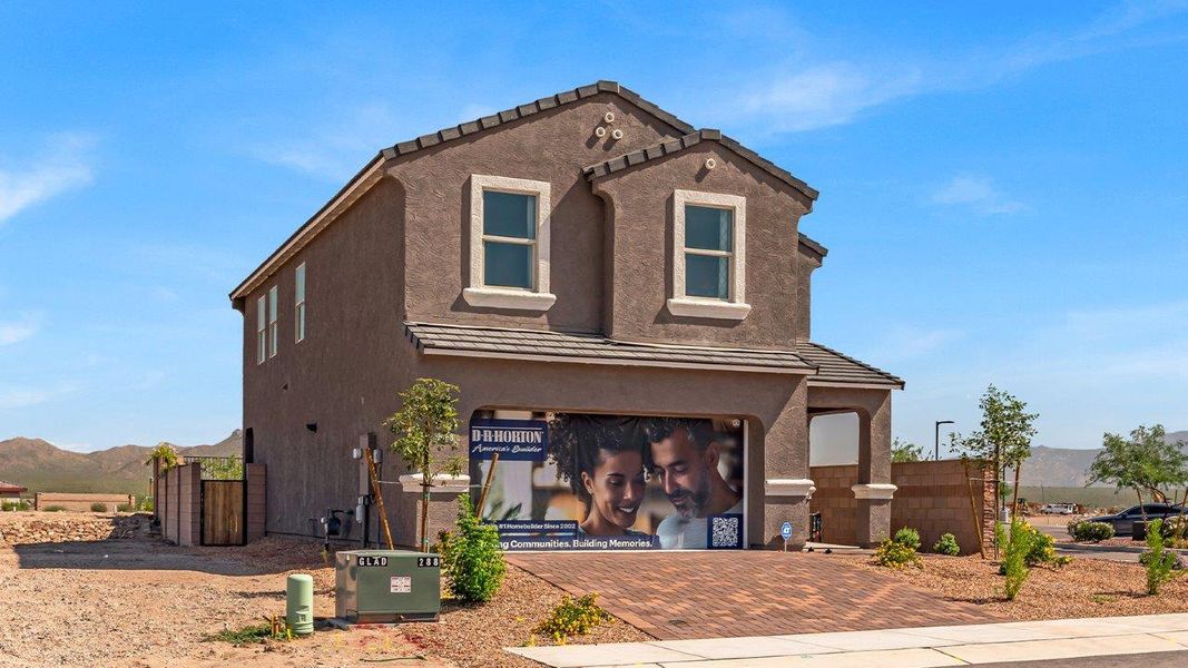 Front exterior of a home in the Coronet at Gladden Farms community, located in Marana, AZ (Image 5).