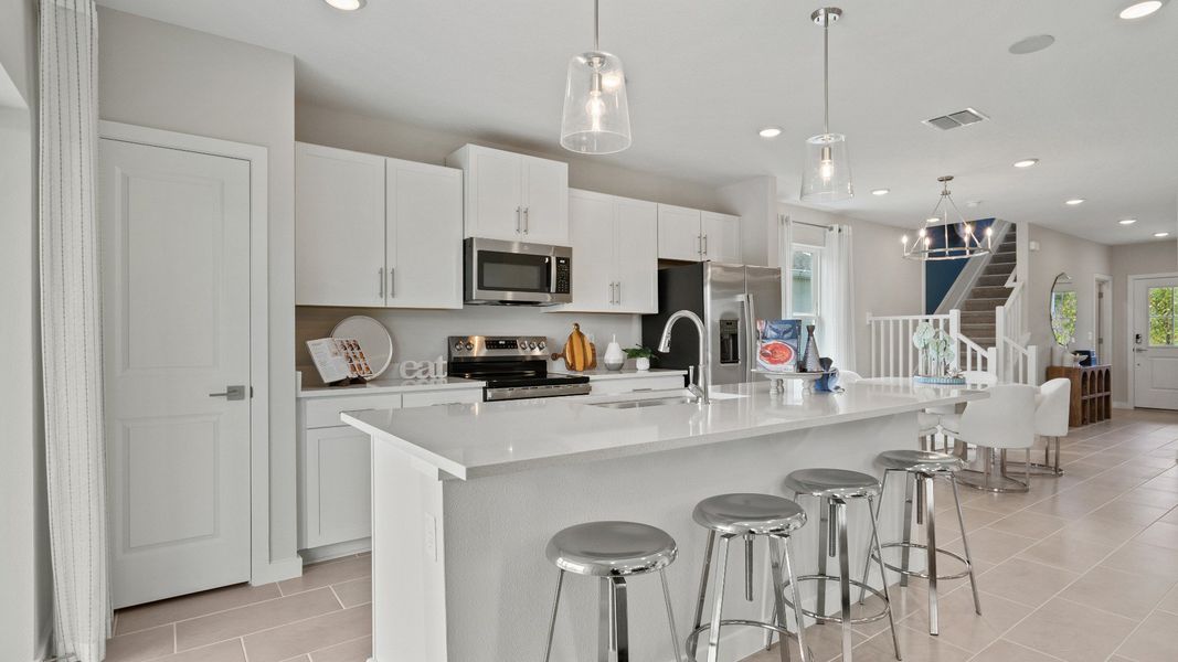 Coastal Kitchen in New Single Family Homes in New Smyrna Beach Ardisia Park DRB Homes.