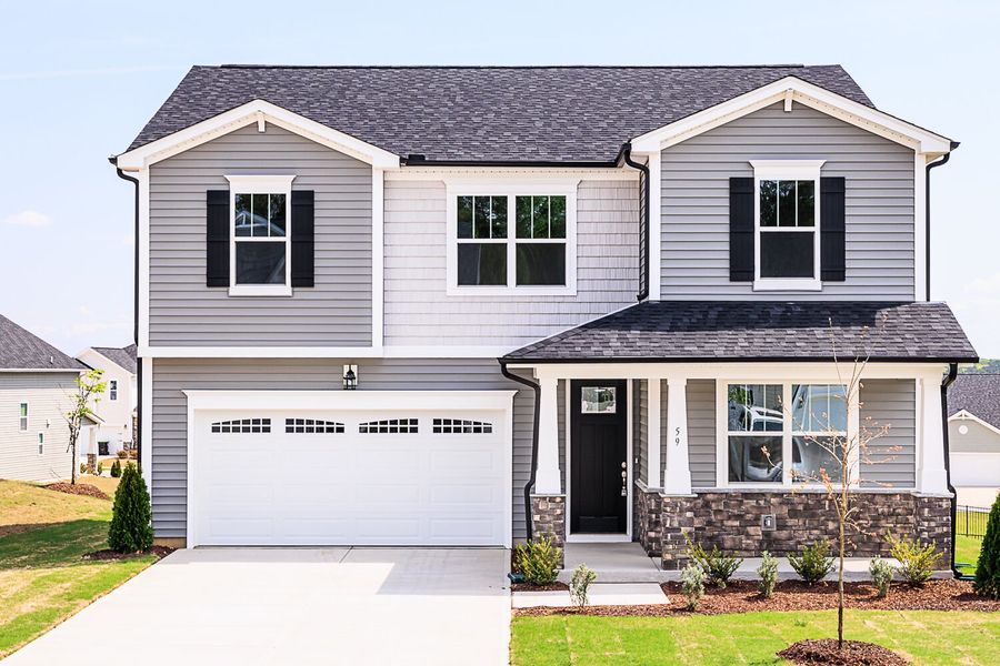 Front exterior of a home in the Seagrass Landing community, located in Lillington, NC (Image 2). Front exterior of a home in the Seagrass Landing community, located in Lillington, NC (Image 2).