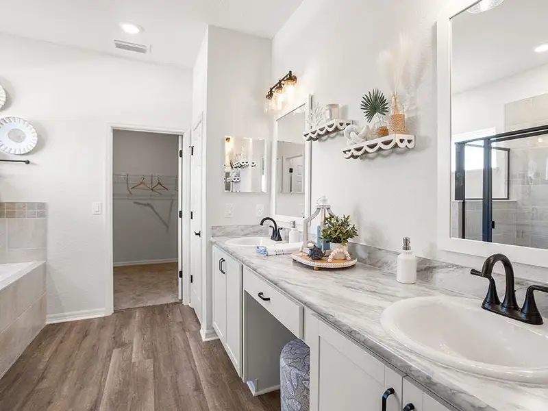 You`ll love the privacy and convenience of an en-suite owner`s bath - Westin II home plan