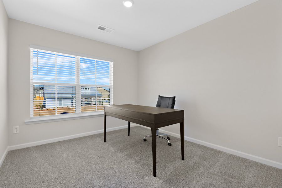 Furnished interior in a model home at Anderson Village in Spartanburg (Image 17).