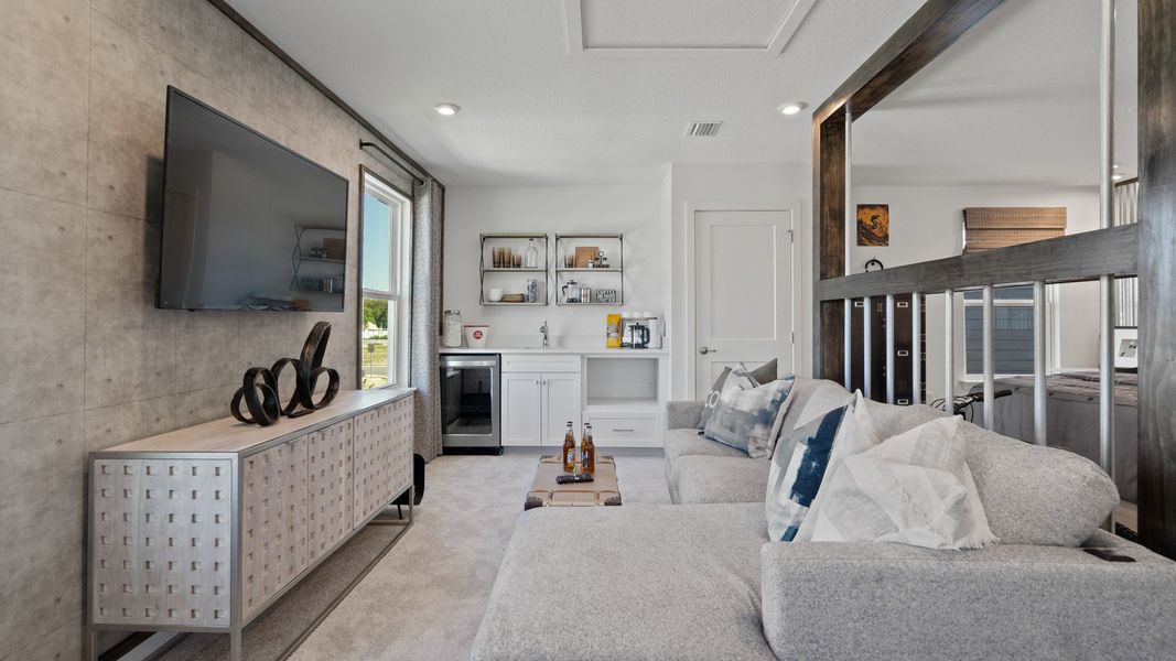 Trinity Place Staged Model Ambersweet Loft Area by DRB Homes in Saint Cloud FL Trinity Place Staged Model Ambersweet Loft Area by DRB Homes in Saint Cloud FL