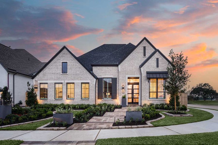 Front exterior of a home in the Sienna community, located in Missouri City, TX (Image 2).