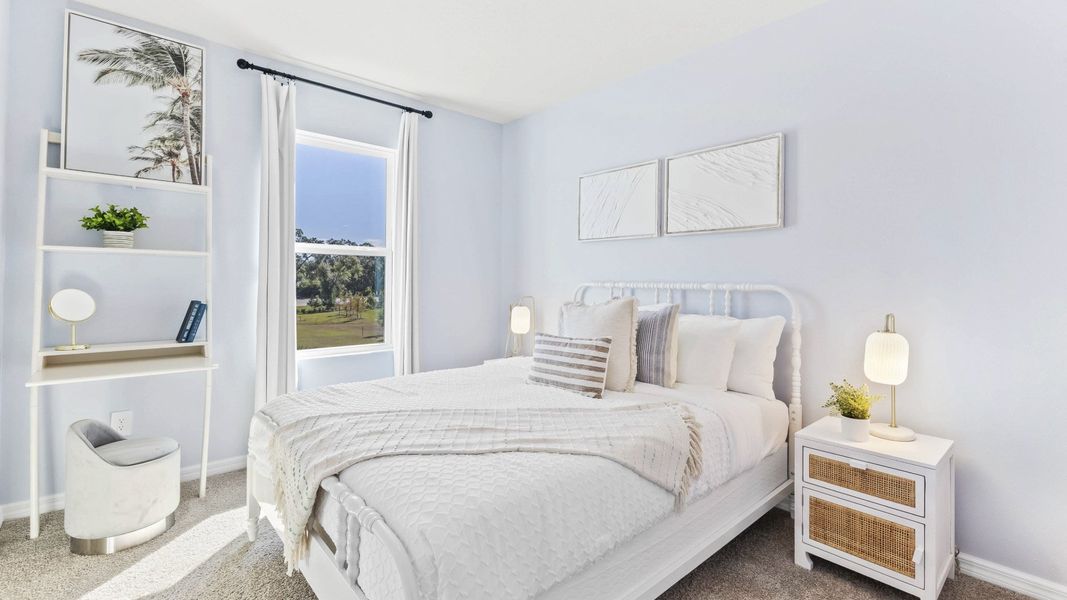 Furnished interior in a model home at The Gardens at Bay Street in Sarasota (Image 13).