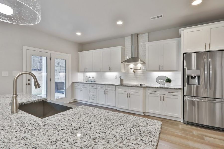 Furnished interior in a model home at Estates at Dorsett Bridge in Douglasville (Image 13).