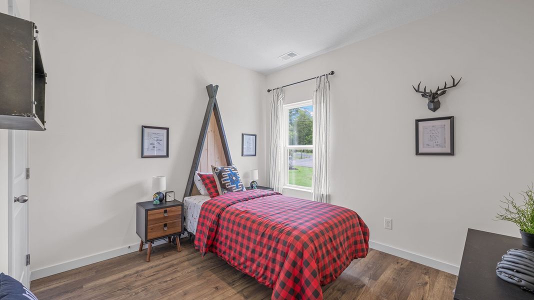 Furnished interior in a model home at Hillcrest Landing in McDonald (Image 6).