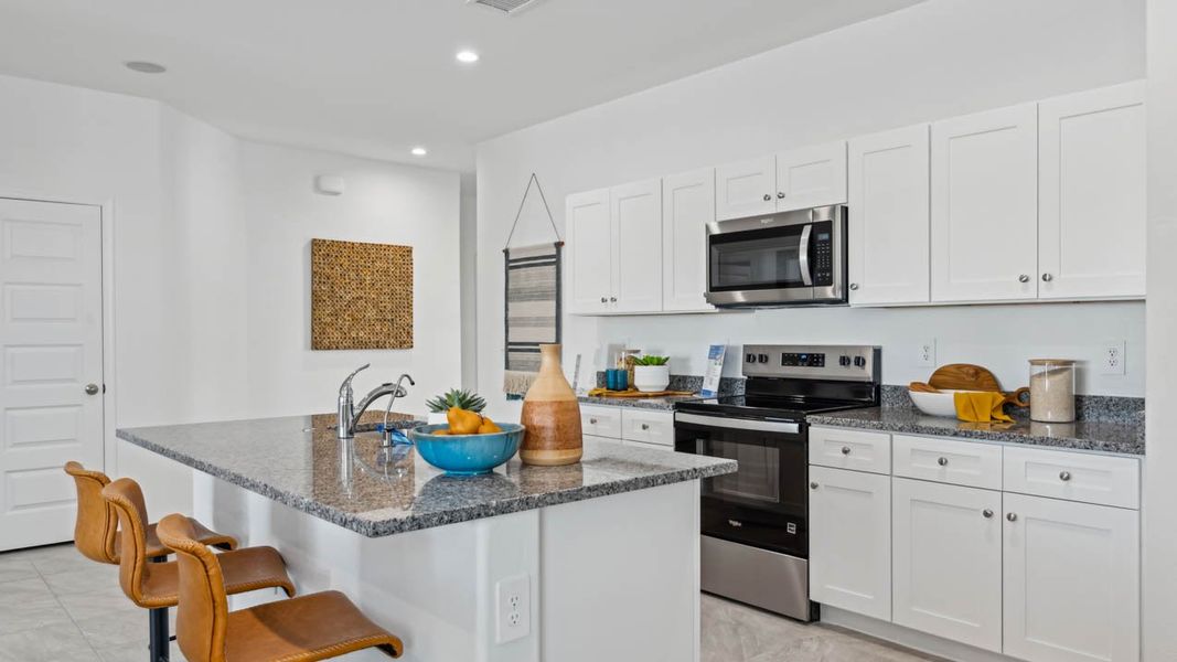 Furnished interior in a model home at Elena Trails in Maricopa (Image 25).