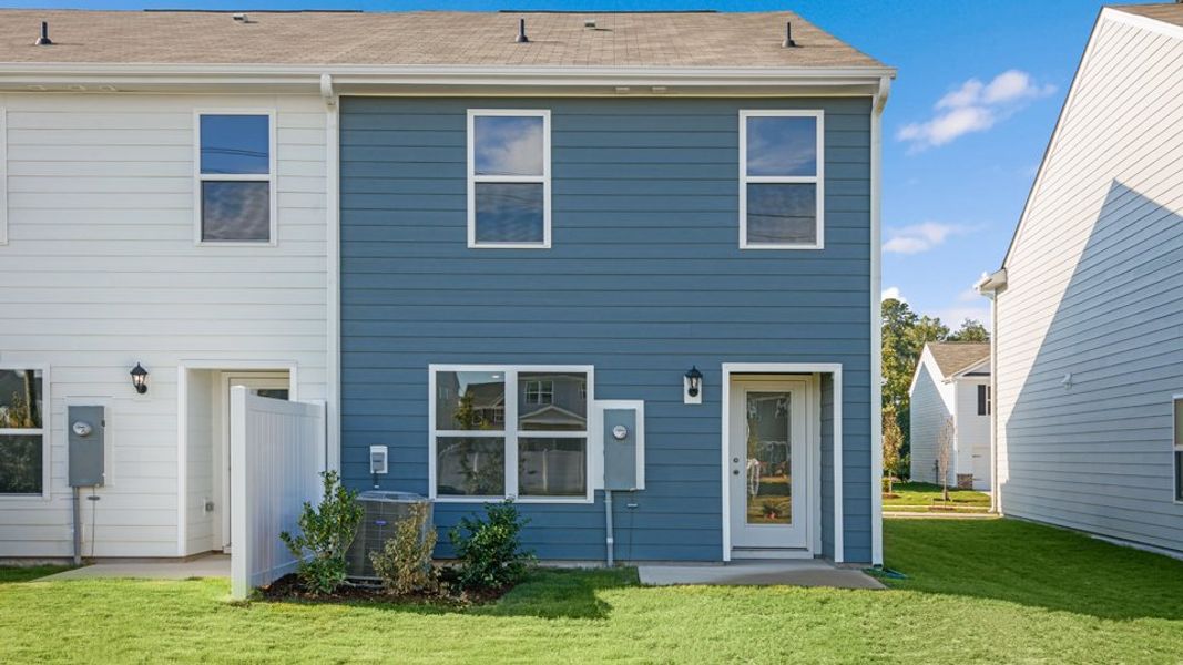 Front exterior of a home in the The Townes at Belle Grove community, located in Wendell, NC (Image 18).