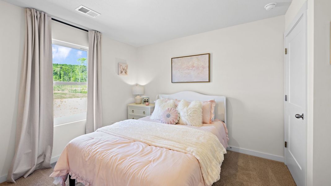 Furnished interior in a model home at Timber Creek in Rossville (Image 7).