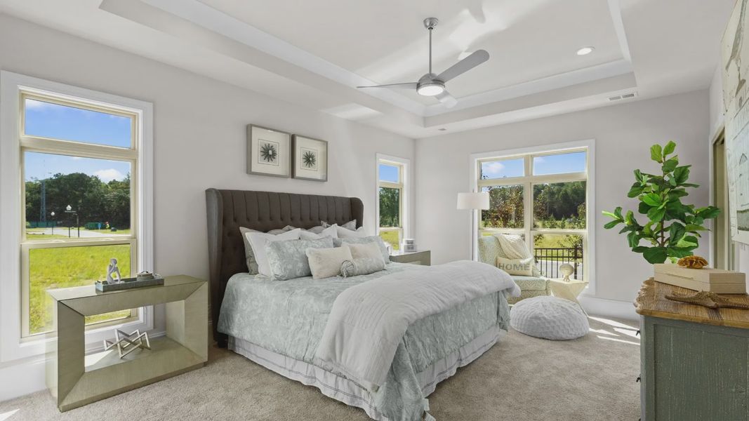 Furnished interior in a model home at Courtyards by Carrell in Ocean Isle Beach (Image 16).