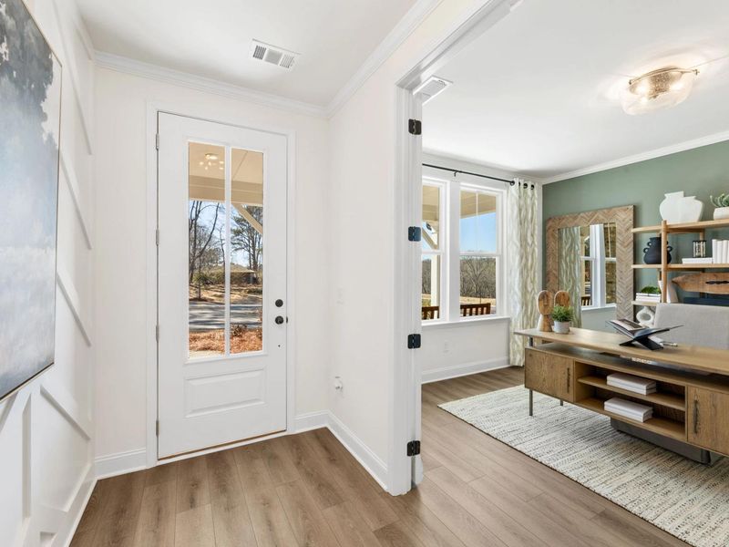 Furnished interior in a model home at Fern Hollow in Buford (Image 9).