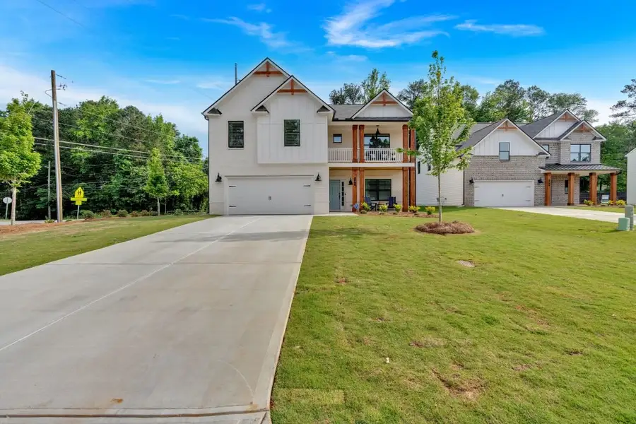 Front exterior of a home in the The Overlook at Factory Shoals community, located in Mableton, GA (Image 4).