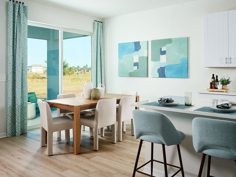 Furnished interior in a model home at Coasterra - Reserve Series in Palmetto (Image 6).