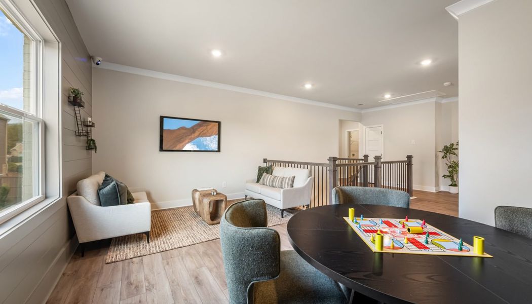 Furnished interior in a model home at Pinecrest Ridge in Dacula (Image 43).