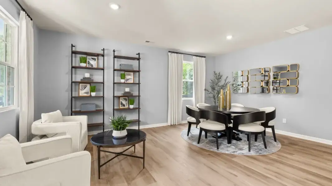 Furnished interior in a model home at Enclave at Stonewall Tell in South Fulton (Image 4).