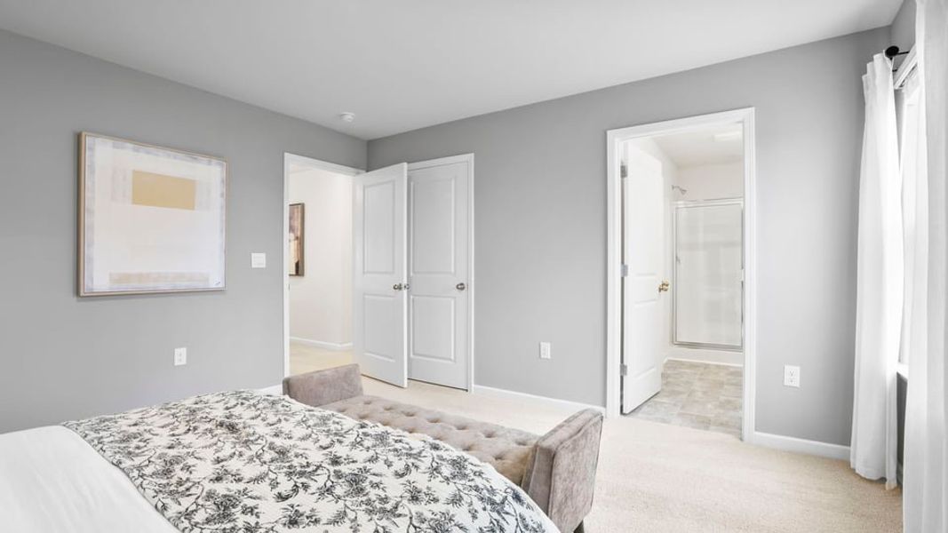 Furnished interior in a model home at Benjamin's Grove in Woodruff (Image 28).