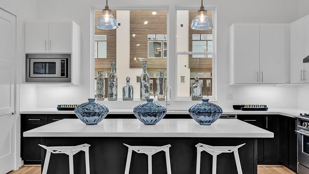 Furnished interior in a model home at Commerce Row in Houston (Image 4).