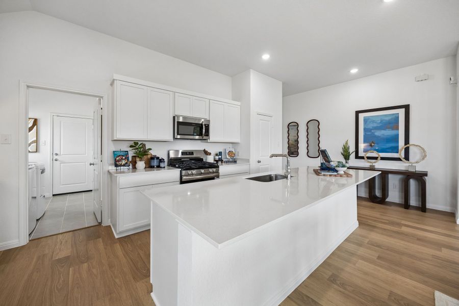 Kitchen in the Diamond Model Home by Trophy Signature Homes