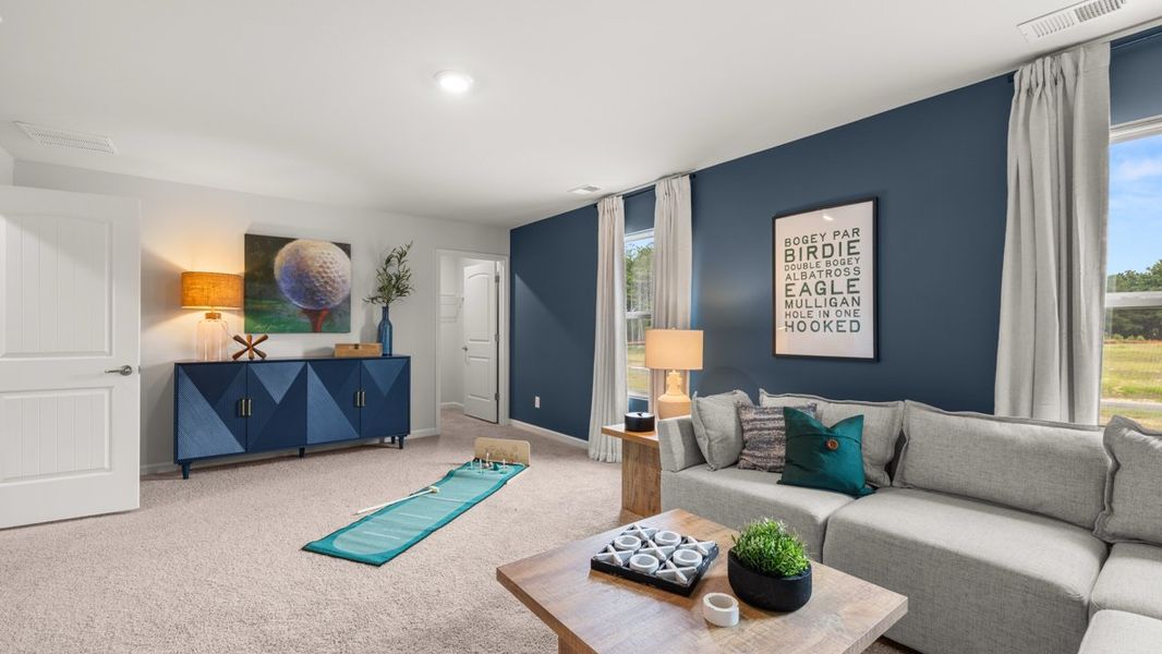 Furnished interior in a model home at Fairway 17 at Mirror Lake in Villa Rica (Image 40).