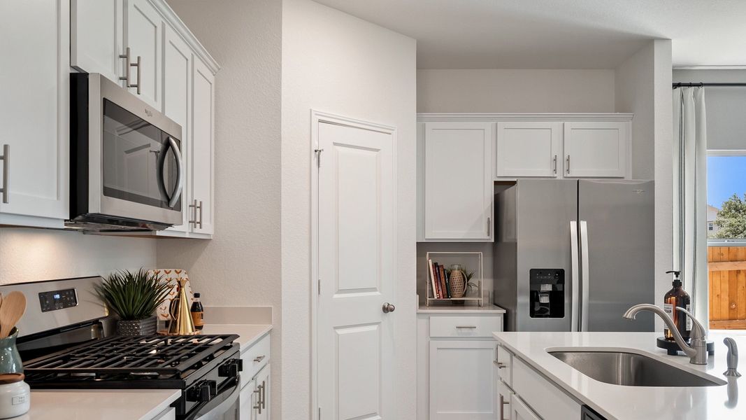 Furnished interior in a model home at Rosenbusch Ranch in Leander (Image 57).