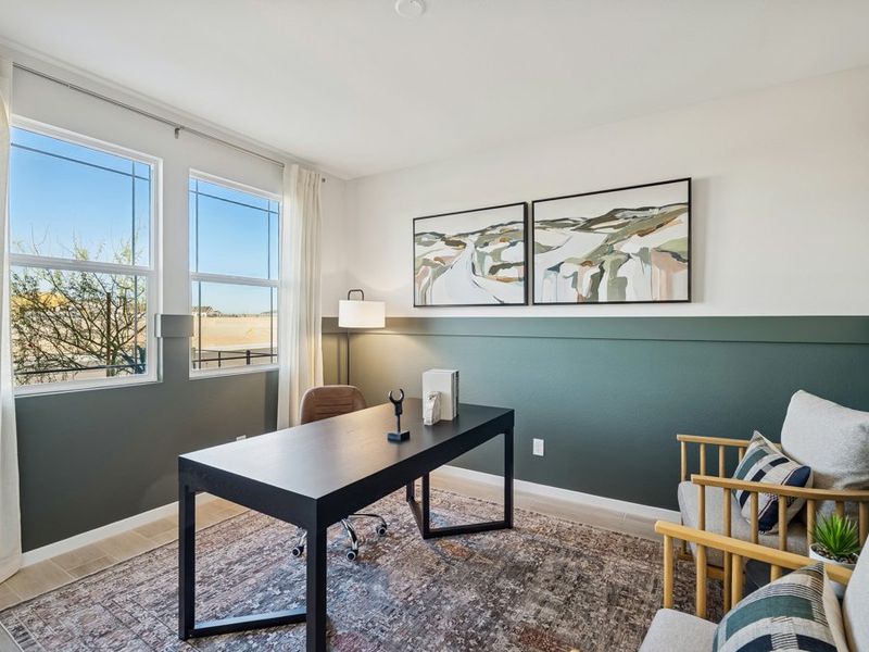 A room with a table and chairs. A room with a table and chairs.