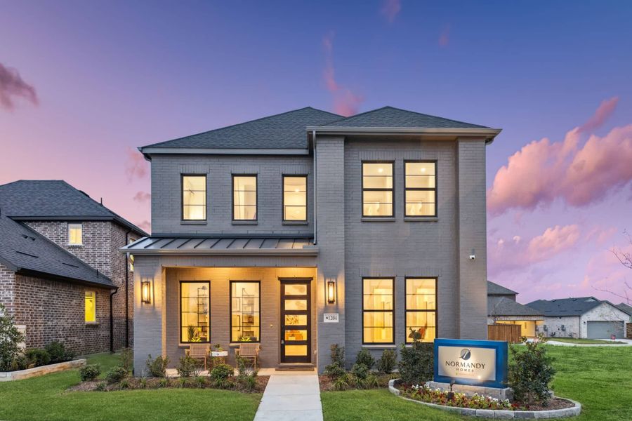 Front exterior of a home in the Cross Creek Meadows 40' Series community, located in Celina, TX (Image 4). Front exterior of a home in the Cross Creek Meadows 40' Series community, located in Celina, TX (Image 4).