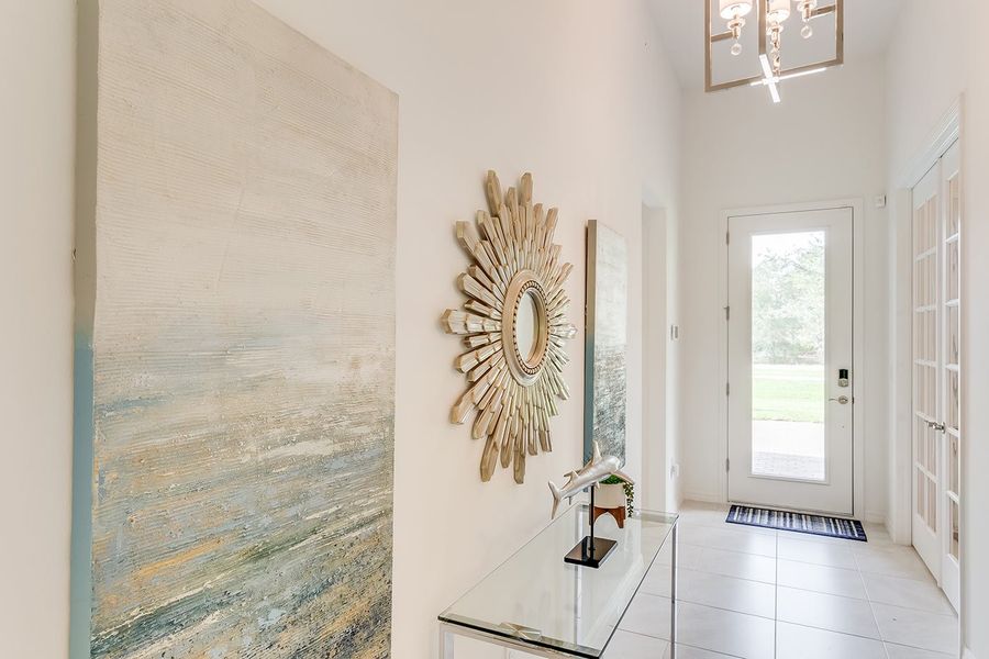 Furnished interior in a model home at Deep Creek Tradition Series in Punta Gorda (Image 11).