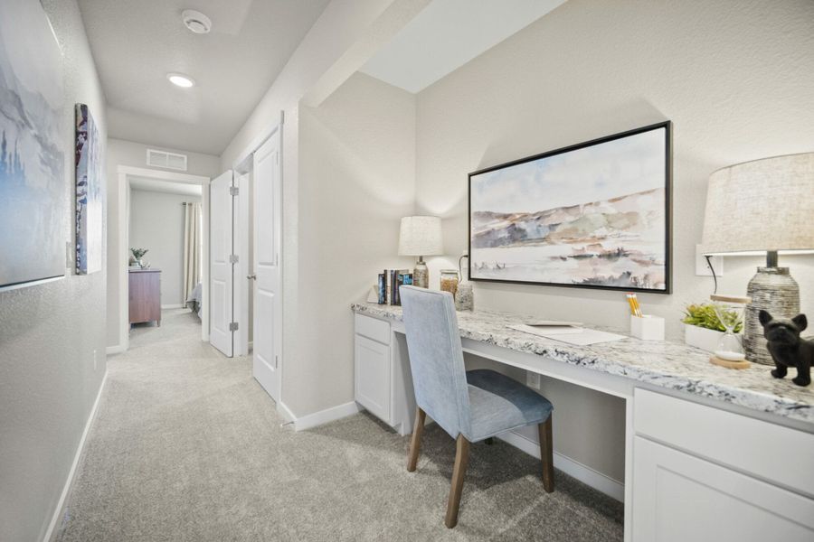 Furnished interior in a model home at Aspen Meadows – Townhomes in Colorado Springs (Image 11). Furnished interior in a model home at Aspen Meadows – Townhomes in Colorado Springs (Image 11).