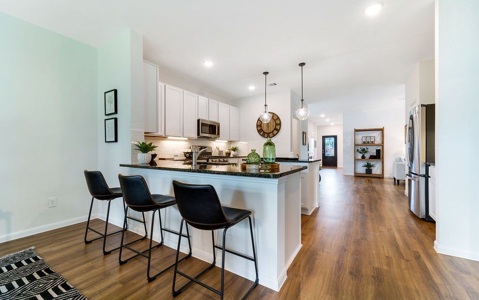 Furnished interior in a model home at The Pines at Seven Coves in Willis (Image 16).