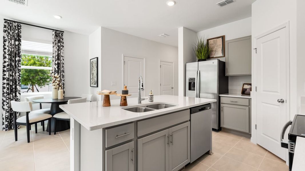 Furnished interior in a model home at The Towns at Skye Ranch in Sarasota (Image 5).