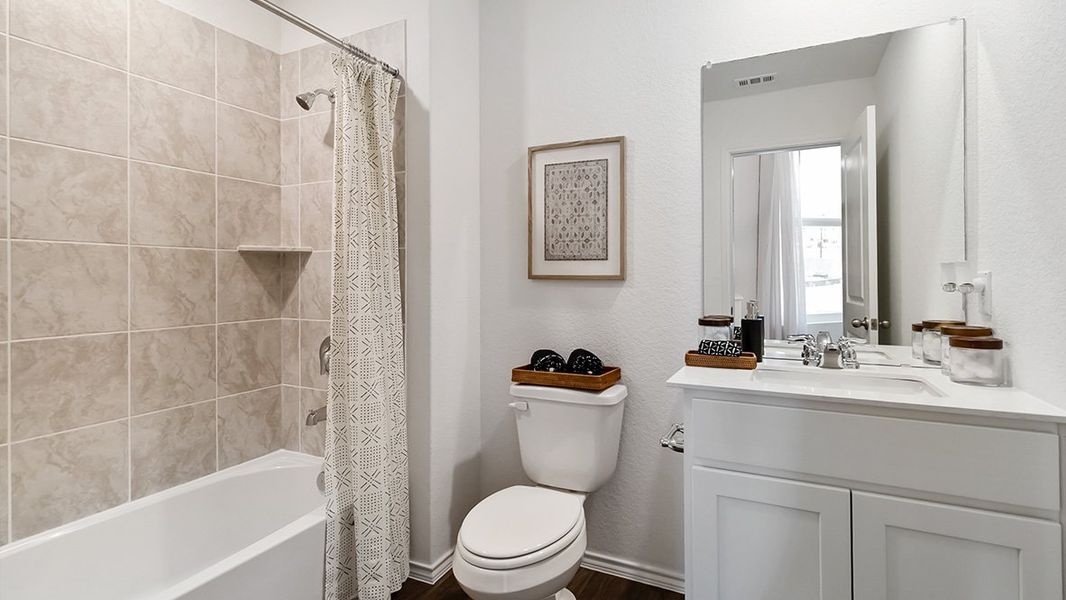 Furnished interior in a model home at Sereno Springs in Converse (Image 27).