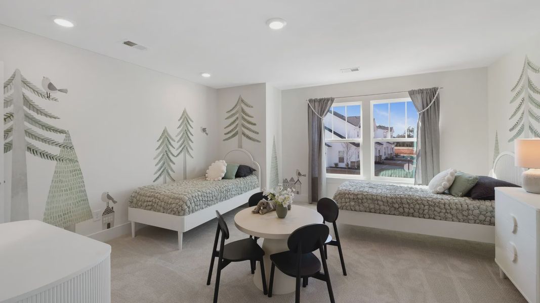 Cozy secondary bedroom with plush carpet at Barton Hollow by DRB Homes in Fountain Inn, SC