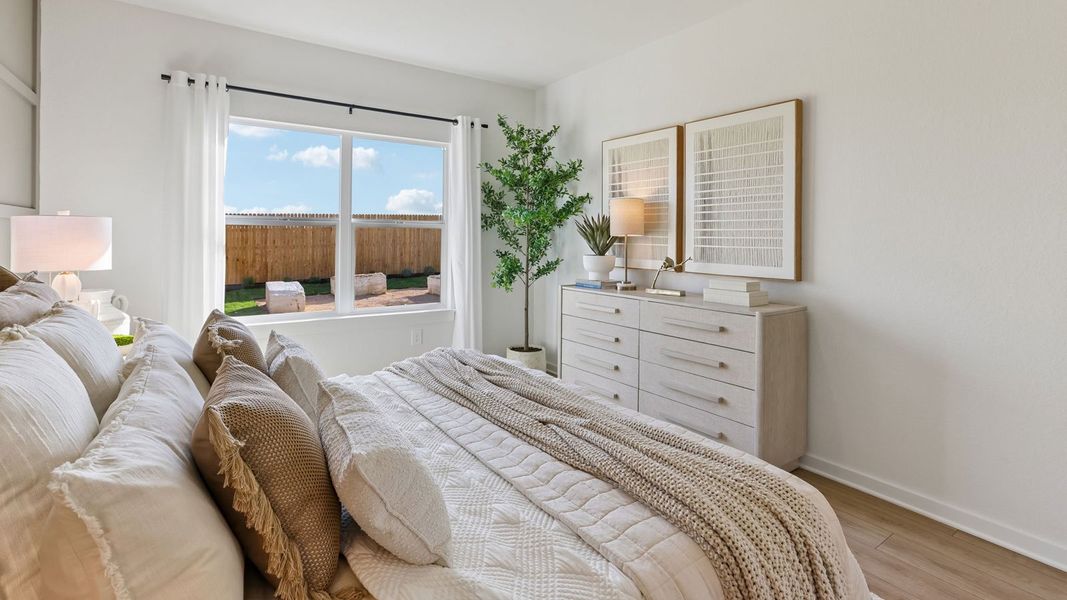 Furnished interior in a model home at Frontier in Mustang Ridge (Image 20).