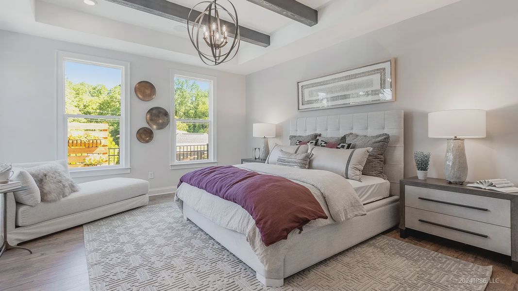 Furnished interior in a model home at The Courtyards at Redbud Lane in Holly Springs (Image 10).