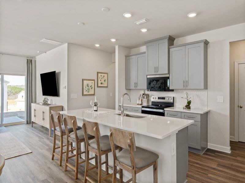 Furnished interior in a model home at Russell Grove - Rolling Hills Series in Charlotte (Image 3).